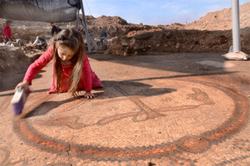 Working on the Mosaic of 1,500 year-old-Byzantine Church discovered in Israel: Photo by by Yoli Shwartz and Dr Davida Dagan courtesy of the Israel Antiquities Authority