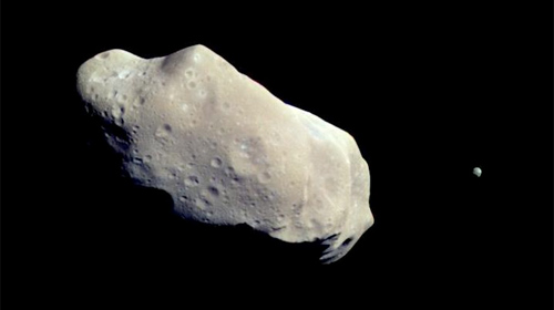 According to former Nasa scientists, it's blind luck a populated are of earth hasn't been hit by an asteroid. Photo an asteroid called '243 Ida" taken by the Galileo spacecraft. This asteroid is big enough to have its own moon (right): Wikipedia/Nasa