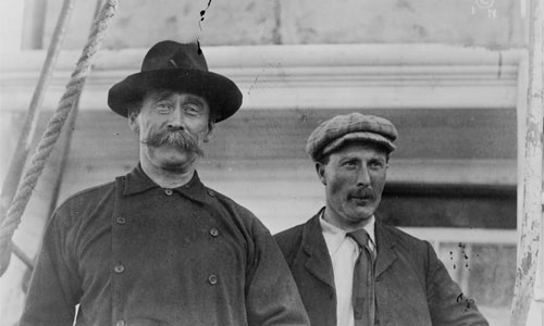 Robert Peary and Captain Robert Bartlett on their ship in Battle Harbour, Labrador, Canada in 1909