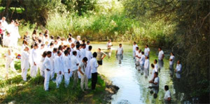 Iranians dressed in white waiting to be baptized. Photo: Elam Ministries