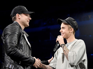 Justin Bieber with Judah Smith at LA concert.