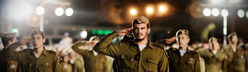 Israeli officers saluting their flag Photo: Israel Defense Forces/Flickr/Creative Commons