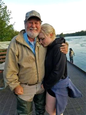 Pastor Andy Foor with the young woman he rescued on July 15, 2016 along the banks of Alaska's Kenai River.
