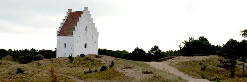 The Bell tower of the Sand covered church sticking out of the ground near Skagen, Denmark Credit: Myrna Petersen