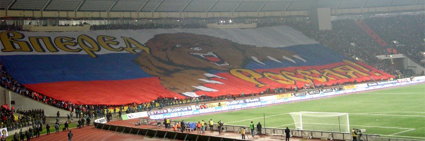 Russian supporters unveiling massive banner portraying an dangerous bear and the words "Russia Forward" prior to Euro 2008 soccer match against England Credit: Roman Kovrigin/Wikipedia