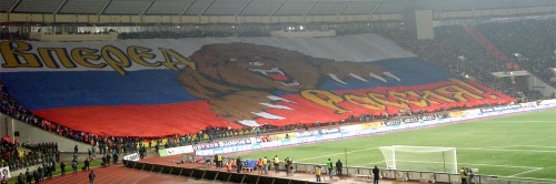 Russian supporters unveiling massive banner portraying an dangerous bear and the words "Russia Forward" prior to Euro 2008 soccer match against England Credit: Roman Kovrigin/Wikipedia