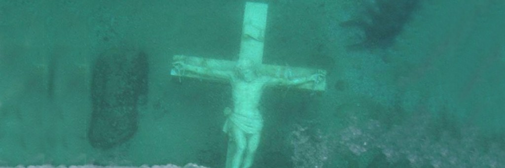 Why is a life-sized statue of Christ resting at the bottom of Lake&nbsp;Michigan?