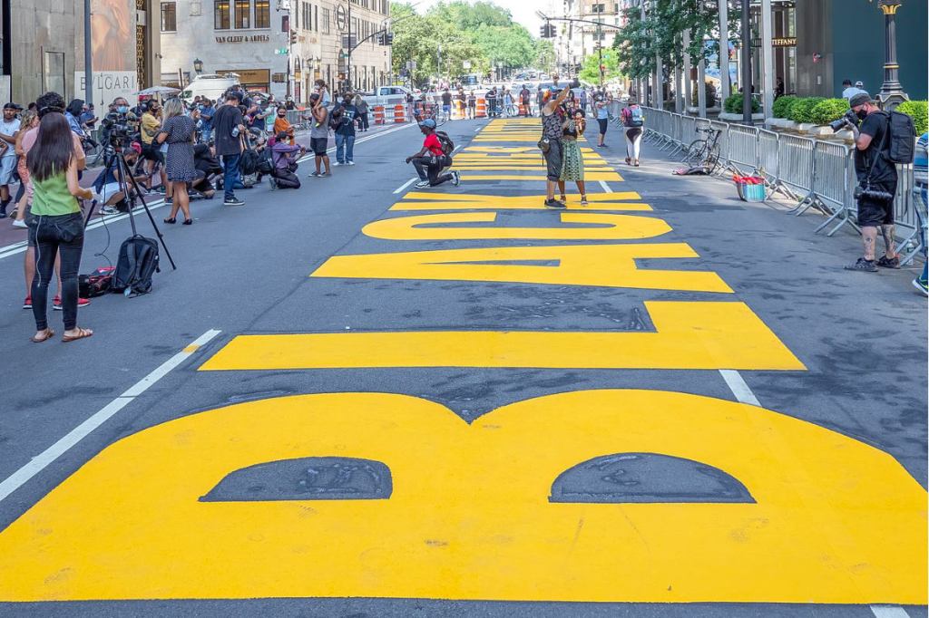 Black woman paints over BLM words in New&nbsp;York