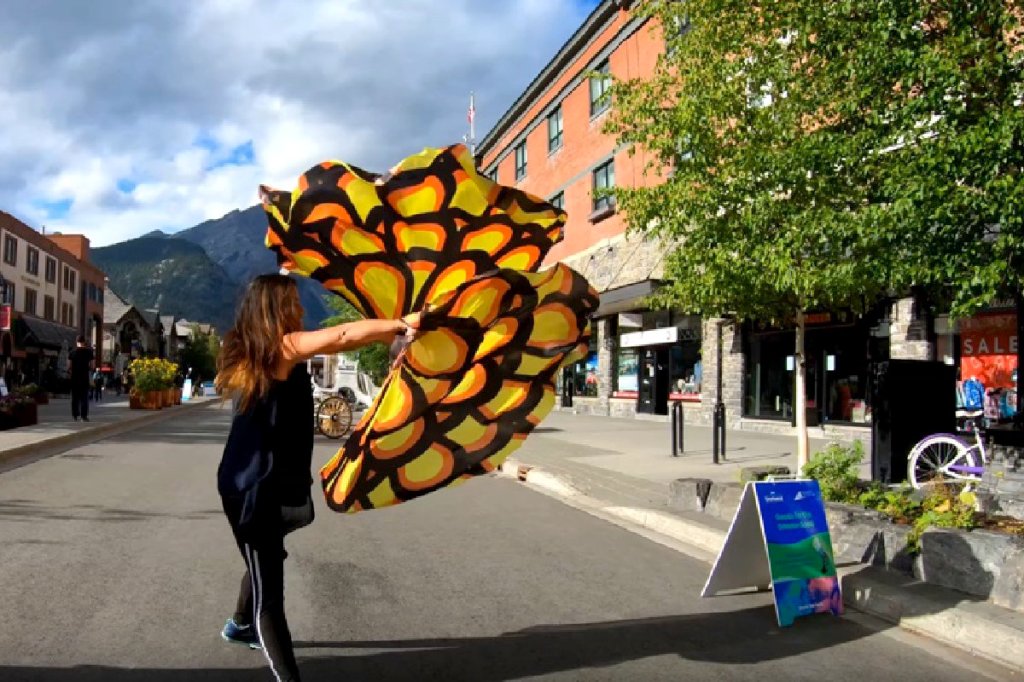Christian woman flagging outdoors in Banff,&nbsp;Canada