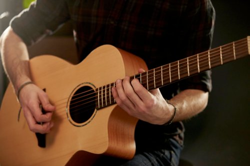 Man playing a guitar