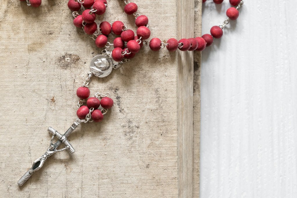 Rosary Beads compared to assault&nbsp;weapons?