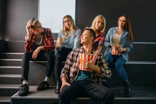 Group of young adults sitting on steps