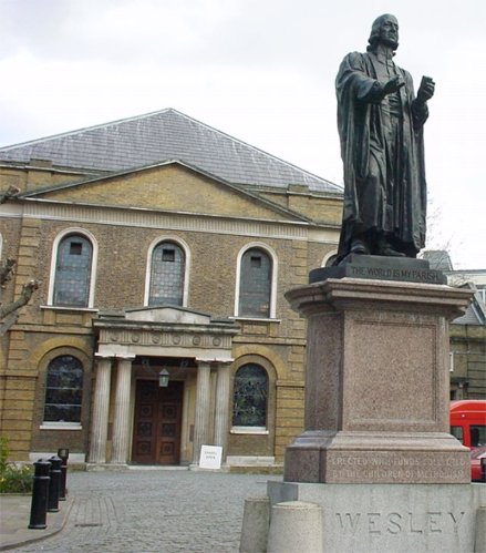 Wesley Chapel in London, England with a statue of John Wesley on the outside
