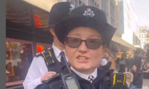 Volunteer Special Constable from London England telling Harmonie London that she is not allowed to sing gospel songs outside of Church grounds.