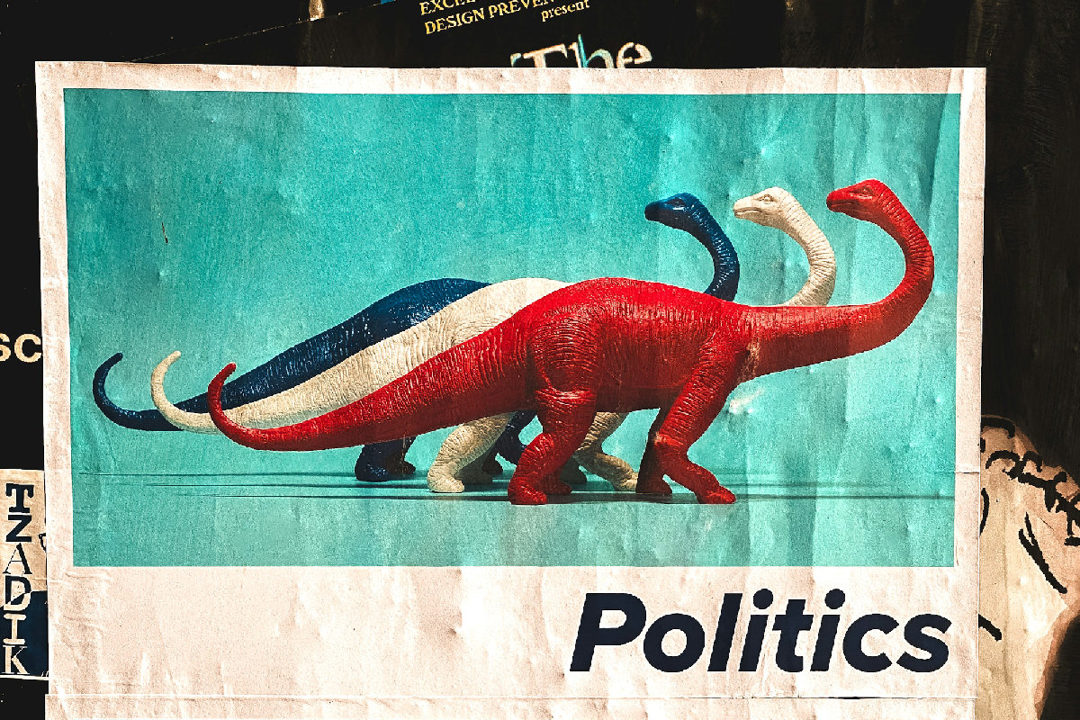 Political sign with three dinosaurs