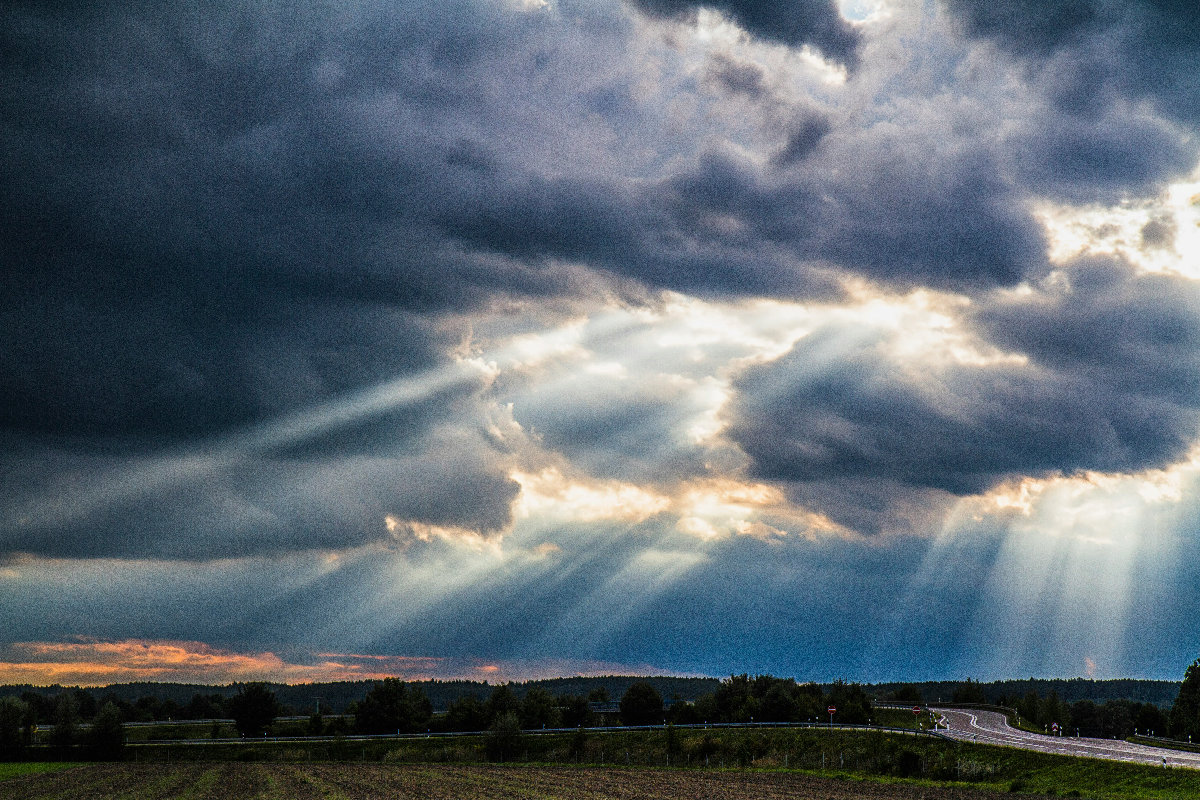 Sun Rays piercing through clouds