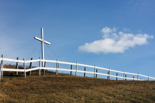 White cross in a field near Gaspé, QC, Canada