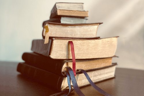 Stack of Bibles sitting on a table