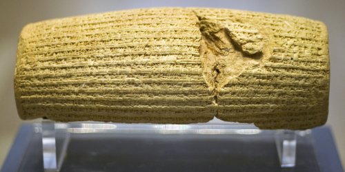 Photo of the Cyrus Cylinder on display in The British Museum.