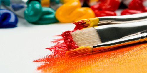 Paint brushes on a canvas