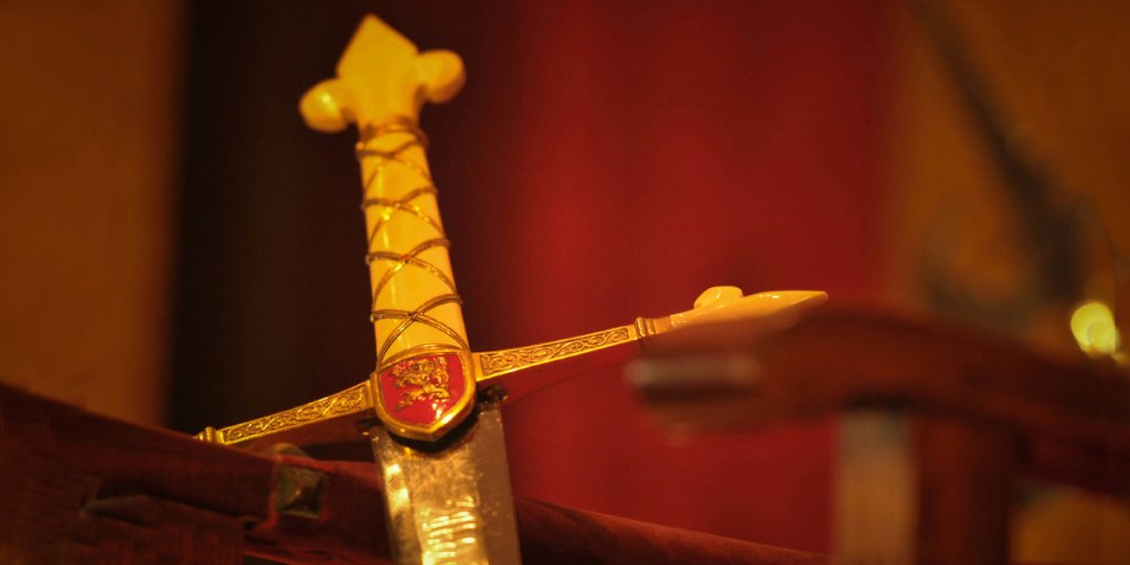Sword leaning against chair